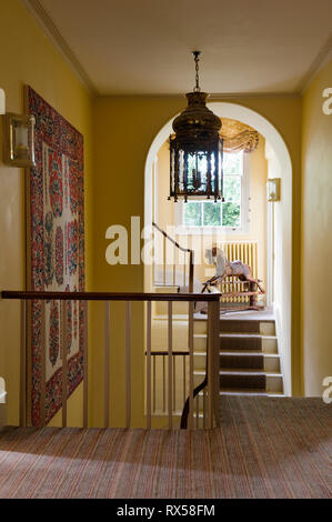 Pendant light over staircase Stock Photo