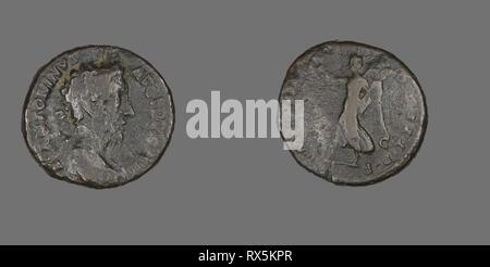 As (Coin) Portraying Emperor Marcus Aurelius. Roman. Date: 177 AD-178 AD. Dimensions: Diam. 2.6 cm; 11.49 g. Bronze. Origin: Roman Empire. Museum: The Chicago Art Institute. Author: ANCIENT ROMAN. Stock Photo