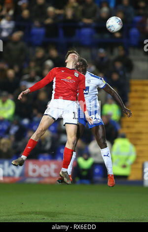 Birkenhead, UK. 08th Mar, 2019. Callum Ainley of Crewe Alexandra (l) and Zoumana Bakayogo of Tranmere Rovers jump for the ball. EFL Skybet Football league two match, Tranmere Rovers v Crewe Alexandra at Prenton Park, Birkenhead, Wirral on Friday 8th March 2019. this image may only be used for Editorial purposes. Editorial use only, license required for commercial use. No use in betting, games or a single club/league/player publications.pic by Chris Stading/Andrew Orchard sports photography/Alamy Live News Credit: Andrew Orchard sports photography/Alamy Live News