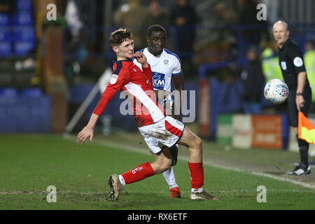 Birkenhead, UK. 08th Mar, 2019. Zoumana Bakayogo of Tranmere Rovers knocks the ball past Callum Ainley of Crewe Alexandra. EFL Skybet Football league two match, Tranmere Rovers v Crewe Alexandra at Prenton Park, Birkenhead, Wirral on Friday 8th March 2019. this image may only be used for Editorial purposes. Editorial use only, license required for commercial use. No use in betting, games or a single club/league/player publications.pic by Chris Stading/Andrew Orchard sports photography/Alamy Live News Credit: Andrew Orchard sports photography/Alamy Live News