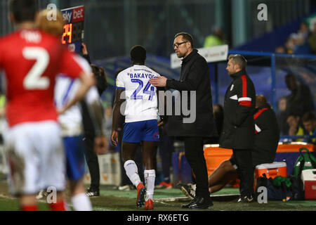 Birkenhead, UK. 08th Mar, 2019. Crewe Alexandra Manager David Artell (l) gives Zoumana Bakayogo of Tranmere Rovers a tap on the back as he is substituted. EFL Skybet Football league two match, Tranmere Rovers v Crewe Alexandra at Prenton Park, Birkenhead, Wirral on Friday 8th March 2019. this image may only be used for Editorial purposes. Editorial use only, license required for commercial use. No use in betting, games or a single club/league/player publications.pic by Chris Stading/Andrew Orchard sports photography/Alamy Live News Credit: Andrew Orchard sports photography/Alamy Live News