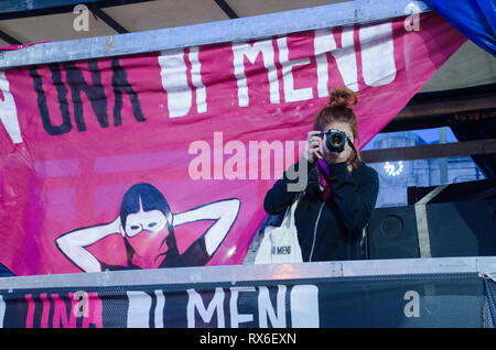 Milan, Italy. 8th Mar 2019. A poster that reads Not One Less during International Women's Day In Milano Stock Photo