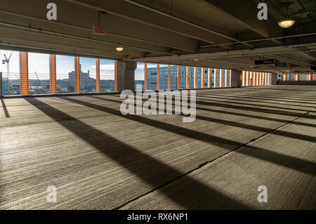 Artistic View Of Empty Car Park Parking Garage Interior With Light And Shadows Stock Photo