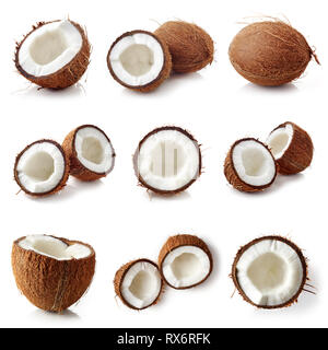 Set of coconut halves and whole coconut isolated on white background Stock Photo