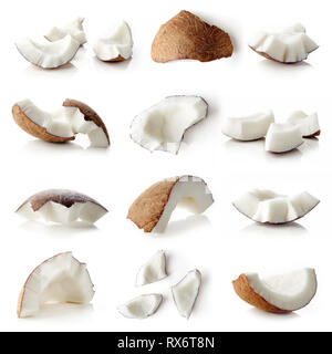 Set of coconut pieces and whole coconut isolated on white background Stock Photo