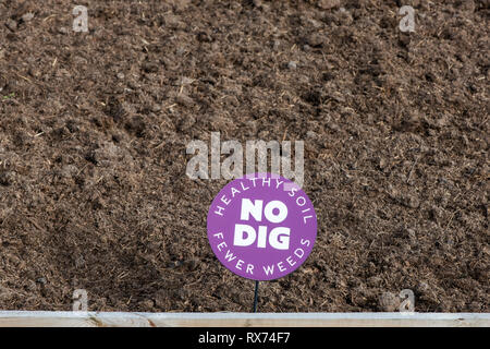No dig sign on an allotment at RHS Wisley gardens, Surrey, UK Stock Photo