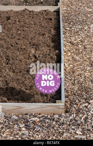 No dig sign on an allotment at RHS Wisley gardens, Surrey, UK Stock Photo