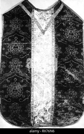 Chasuble. Italy. Date: 1475-1500. Dimensions: 97 x 73 cm (38 1/4 x 28 3/4 in.). Silk, warp-float faced 4:1 satin weave with supplementary pile warps forming cut voided velvet; Orphrey: silk, plain weave with supplementary patterning warps; edged with gilt-metal strip and gilt-metal-strip-wrapped linen, plain weaves self-patterned by main warp floats. Origin: Italy. Museum: The Chicago Art Institute. Stock Photo