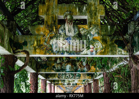 July 2017, Kaiping, China. Covered archway in Kaiping Diaolou Li garden complex with beautiful Chinese style carvings. Diaolou are a UNESCO World Heri Stock Photo