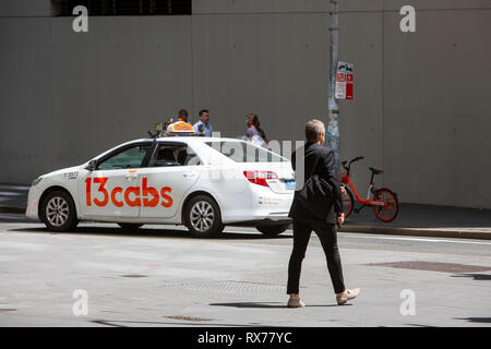 13 cabs Sydney taxi in the city centre,Australia Stock Photo