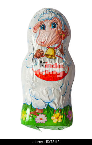 Kinder Easter lamb chocolate isolated on white background - fine milk chocolate shell with milky white lining - ready for Easter Stock Photo