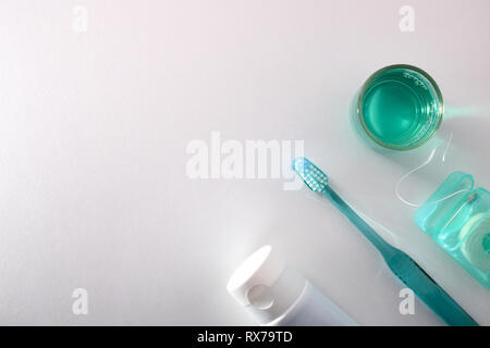 Concept equipment for oral cleaning on a white table top Stock Photo