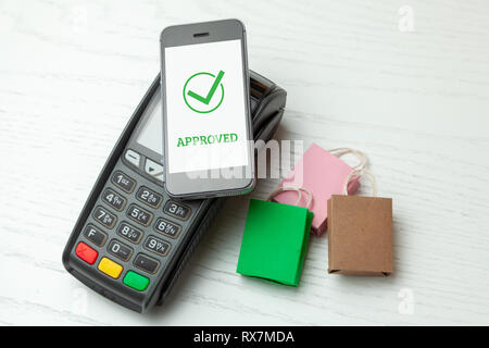 Payment approved POS terminal, Payment Machine with mobile phone on ...