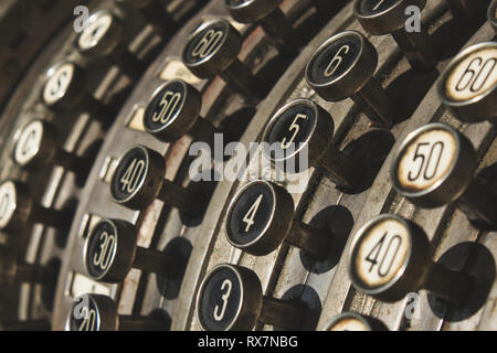 Close-up of numbered buttons on antique cash register Stock Photo