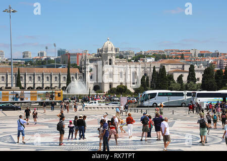 LISBON, PORTUGAL - JUNE 25, 2018: tourists visiting Belem with Jeronimos Monastery on the background, Lisbon, Portugal Stock Photo