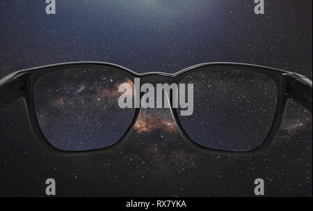 looking through glasses on the sky full of star in starry night Stock Photo