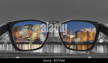 Glasses with city view, selected focus on lens, Color blindness glasses, Smart glass technology Stock Photo