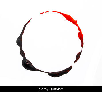 Black and Red Abstract Coffee Cup Stain On White Background Stock Photo