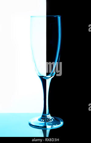 empty glasses for wine and champagne on a multicolored background Stock Photo