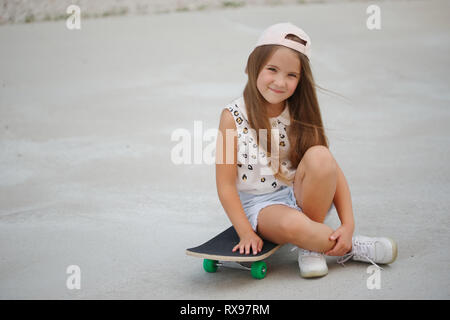 happy little girl with long hair Stock Photo