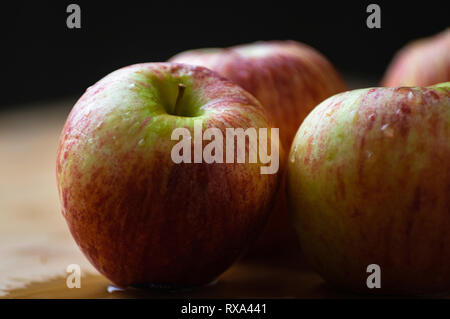 Close-up of wet apples on table during autumn Stock Photo