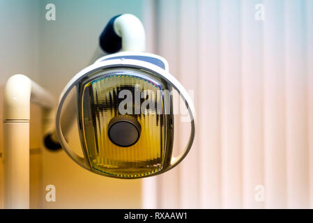 Vintage dental lamp in the clinic close up Stock Photo