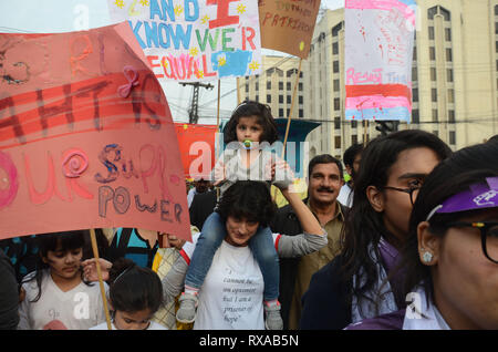 Lahore, Pakistan. 08th Mar, 2019. Women activists from different civil society hold placards during their protest rally from Press Club to Punjab Assembly in connection with International Women's Day. As World observed 8th March International Women Day globally. International Women's Day is marked on March 08 every year and is a global day celebrating the economic, political and social achievements of women past, present and future. Credit: Rana Sajid Hussain/Pacific Press/Alamy Live News Stock Photo