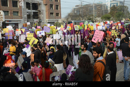 Lahore, Pakistan. 08th Mar, 2019. Women activists from different civil society hold placards during their protest rally from Press Club to Punjab Assembly in connection with International Women's Day. As World observed 8th March International Women Day globally. International Women's Day is marked on March 08 every year and is a global day celebrating the economic, political and social achievements of women past, present and future. Credit: Rana Sajid Hussain/Pacific Press/Alamy Live News Stock Photo