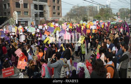 Lahore, Pakistan. 08th Mar, 2019. Women activists from different civil society hold placards during their protest rally from Press Club to Punjab Assembly in connection with International Women's Day. As World observed 8th March International Women Day globally. International Women's Day is marked on March 08 every year and is a global day celebrating the economic, political and social achievements of women past, present and future. Credit: Rana Sajid Hussain/Pacific Press/Alamy Live News Stock Photo