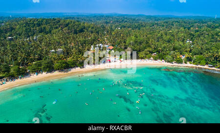 Aerial. Surf beach Hiriketiya, Dikwella, Sri Lanka. Stock Photo