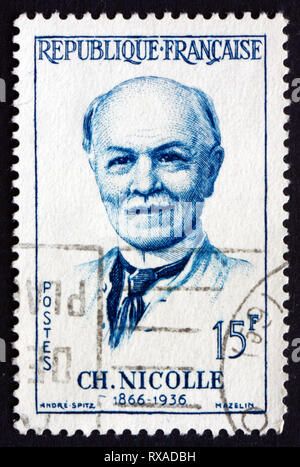 FRANCE - CIRCA 1958: a stamp printed in the France shows Charles Nicolle, French Physicians, Bacteriologist, Winner of the Nobel Prize in Medicine, ci Stock Photo
