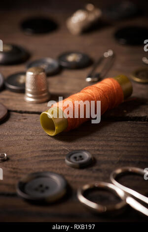 High angle view of various sewing items on fabric Stock Photo
