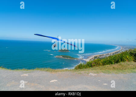 Take-off hanglider pilot leaps off slope 1 Stock Photo