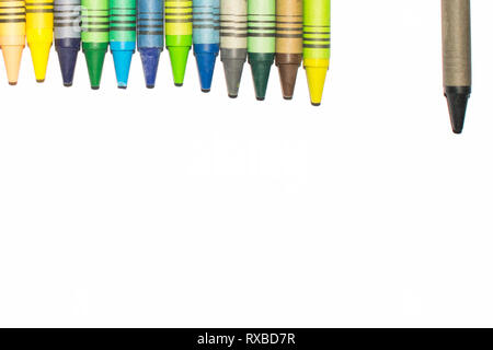 Colorful crayons lined up on a horizontal line with copy space. Stock Photo