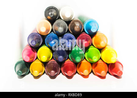 Multi color pastel used for drawing and stacked to form a pyramid Stock Photo