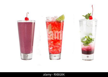 A variety of alcoholic drinks, beverages and cocktails on a white background. Three drinks in glass glasses with decoration. Isolated. Stock Photo
