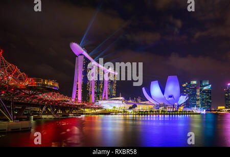 SINGAPORE CITY, SINGAPORE - MARCH 3, 2019: Spectra Light and Water Show Marina Bay Sand Casino Hotel Downtown Singapore Stock Photo