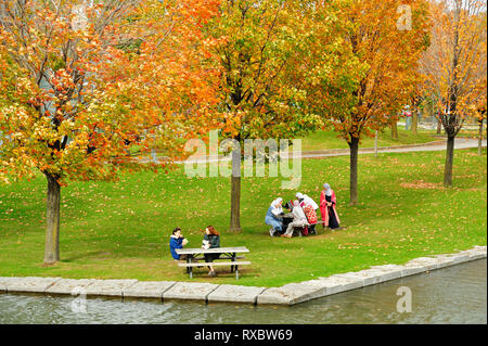 women picnicking in park at Old Port, Montreal, Quebec, Canada Stock Photo