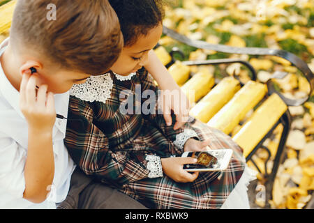 children with phone Stock Photo