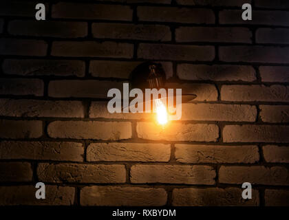 vintage lamp on brick wall background Stock Photo