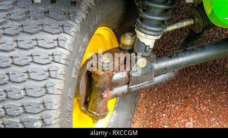 Tire of a big car with green seat. It is big tire from a big car Stock Photo