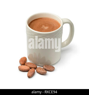 Mug with hot chocolate milk and cocoa beans isolated on white background Stock Photo