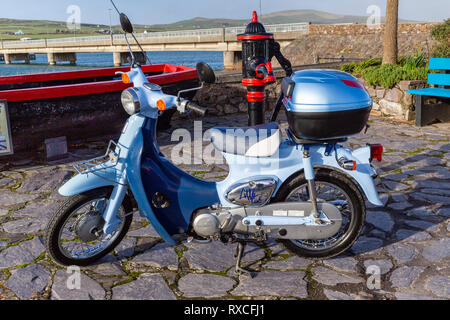 Portmagee Fishing Village, County Kerry, Ireland with Honda Little Cub moped Stock Photo