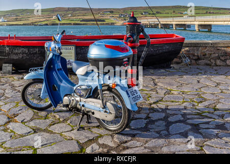 Portmagee Fishing Village, County Kerry, Ireland with Honda Little Cub moped Stock Photo