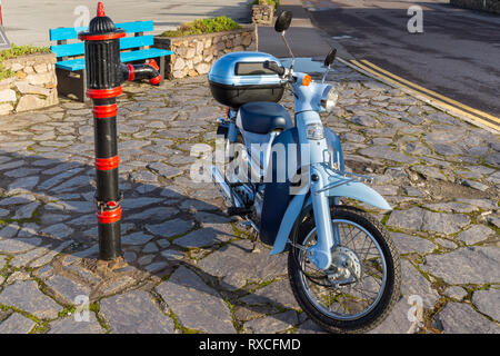 Portmagee Fishing Village, County Kerry, Ireland with Honda Little Cub moped Stock Photo