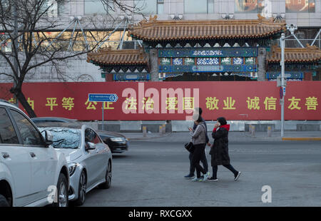 A billboard featuring The Core Socialist Values in Beijing, China. Stock Photo