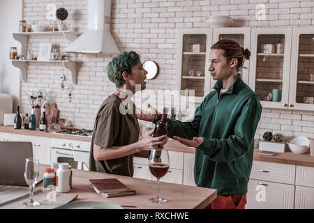 Just married couple having argument about drinking alcohol Stock Photo