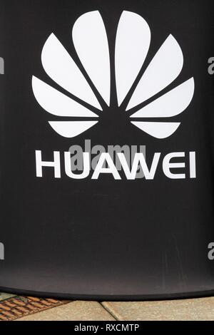 Vejle, Denmark - October 12, 2018: Huawei logo on a wall. Huawei is a Chinese multinational networking and telecommunications equipment and services Stock Photo