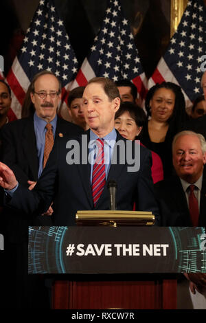 U.S. Senator Ron Wyden of Oregon joins Senate Democrats in a news conference to announce legislation to restore net neutrality protections on Capitol Hill March 6, 2019 in Washington, DC. Net neutrality also called open internet protection was eliminated by the Federal Communications Commission during the Trump administration. Stock Photo