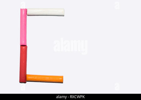 Capital letter C- Letter C from the alphabet, colorful clay sticks on a white background Stock Photo